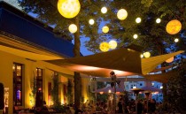 Neighborhood culture: Beer garden with romantic lighting Beer garden in the evening